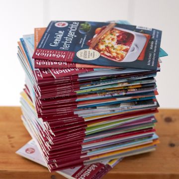 Stapel verschiedener Ausgaben von "köstlich vegetarisch"